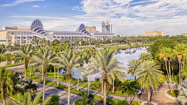 Editorial concept of an international exhibitor planning a custom trade show stand in Orlando